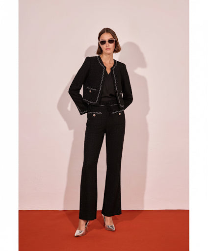 Conjunto chaqueta y pantalón de Tweed negro