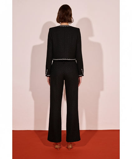 Conjunto chaqueta y pantalón de Tweed negro